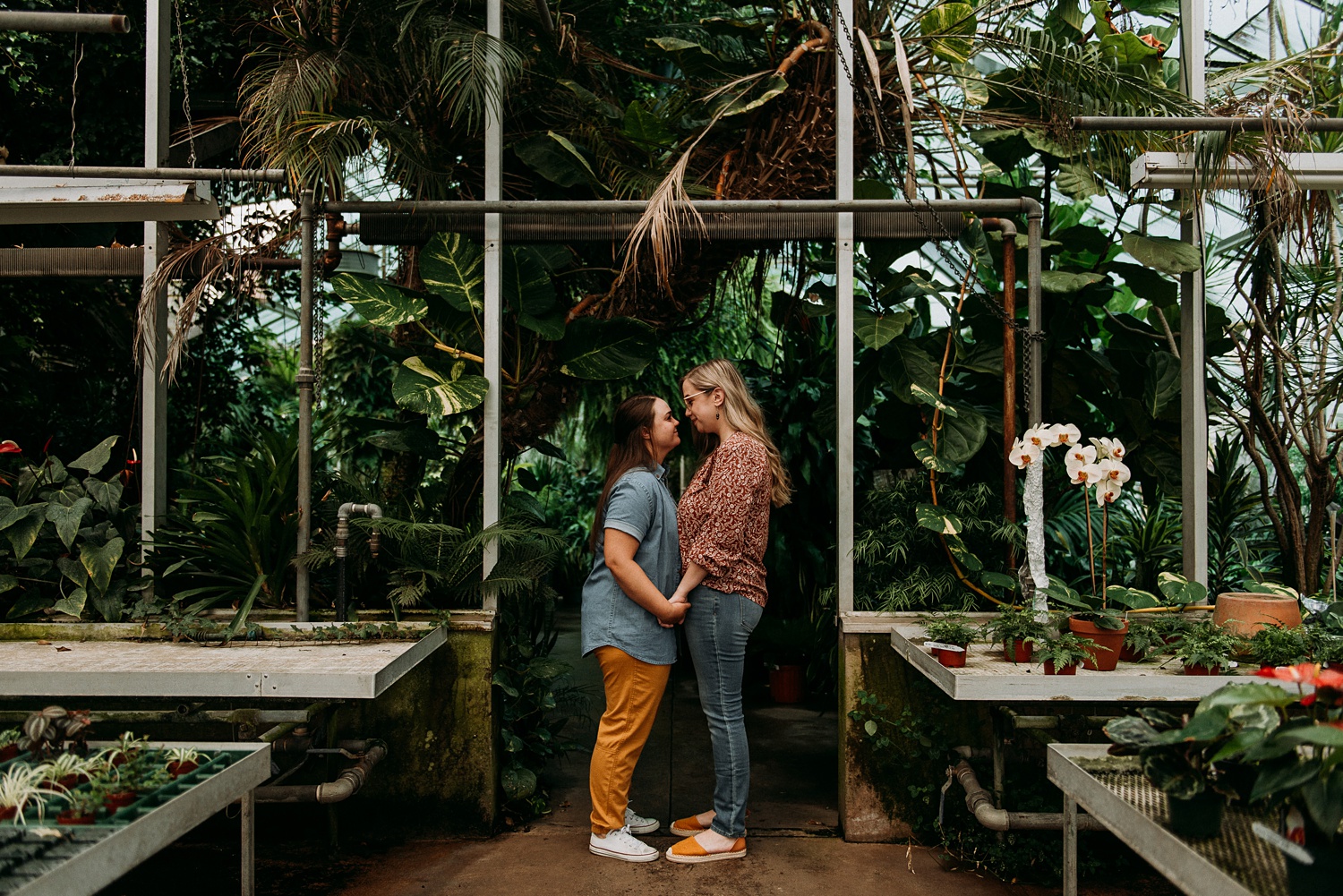 greenhouse same sex engagement session